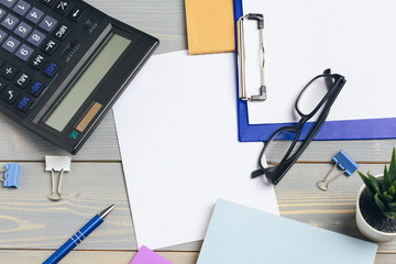 Work place with office stationery close up top view