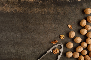 Fototapeta na wymiar frame made of walnut on stone background