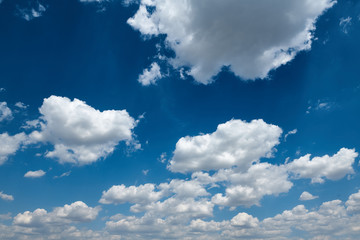 Bright beautiful blue sky with clouds for background or texture