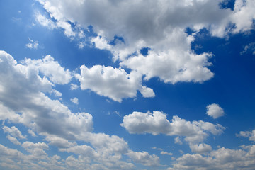 Bright beautiful blue sky with clouds for background or texture
