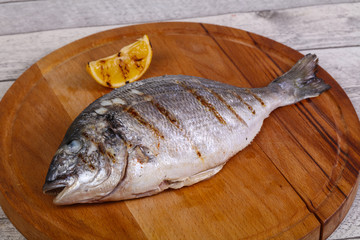 Grilled dorada with lemon