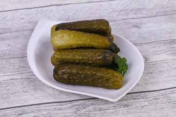 Pickled cucumbers heap in the bowl
