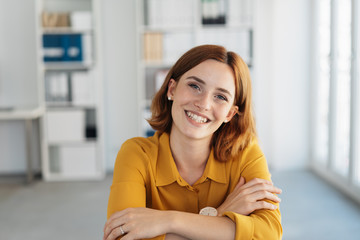 Pretty young woman with a lovely warm smile