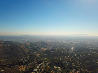 Aerial view of Hollywood valley and Los Angeles city. During blue sunny summer day. Los Angeles, California, USA.