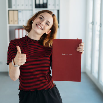 Cheerful successful young job applicant