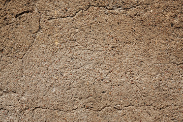Weathered old concrete with cracks abstract texture