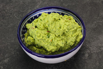Avocado guacamole sauce with chili pepper