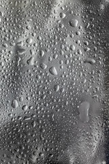 Water drops on a gray background