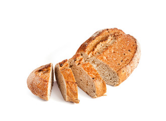 Loaf of whole wheat bread with slices isolated on white background