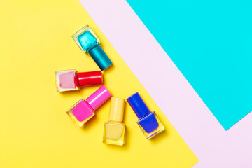 Nail polish bottles pattern background. Close up.