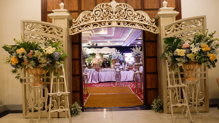 welcome gate designed by gold with flowers