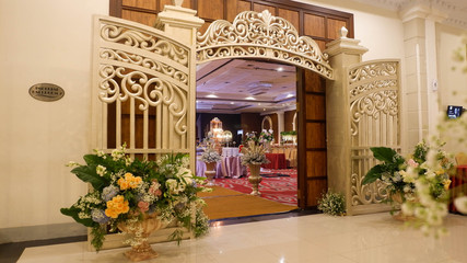 welcome gate designed by gold with flowers