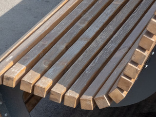 benches located on the street of a small town