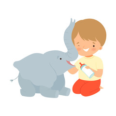 Cute Little Boy Feeding Baby Elephant with Milk Bottle, Adorable Kid Caring for Animal Cartoon Vector Illustration