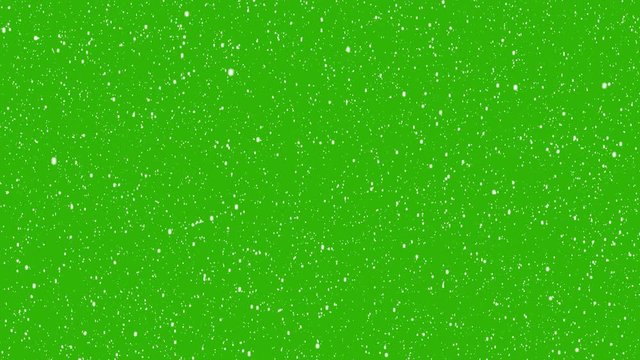 Realistic snow falling on green background. Isolated Flakes to down, Christmas animation with alpha channel.