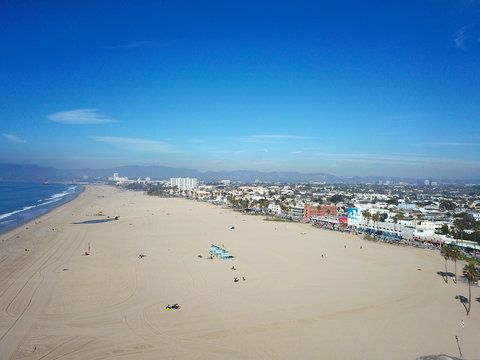 Aerial view of Venice Beach, Los Angeles, California, USA. Pacific ocean with beach during blue summer day