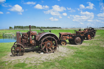 Fototapeta na wymiar An ancient tractor on the island of Saaremaa