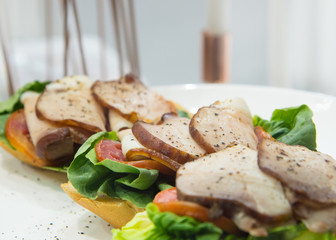 Delicious sandwiches in plate, fast food for breakfast or lunch
