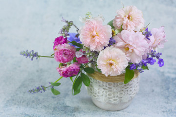 Obraz na płótnie Canvas Beautiful rose flower vase background.