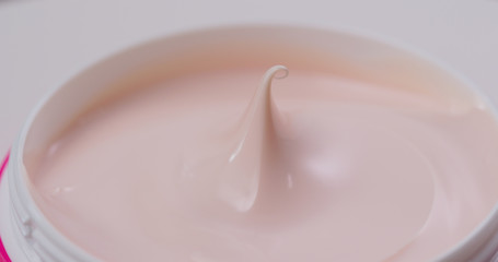 Cosmetics lotion cream in pink colour