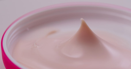 Close up of Pink cosmetics cream