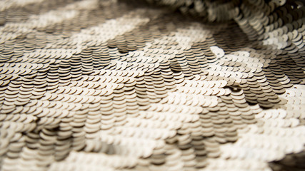 Background of golden sequin Fashion shiny fabric