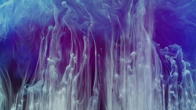 Abstract mist ascends upwards against a blue and purple background