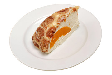 Delicious Cheesecake. Slice of delicious cake with orange on white isolated background