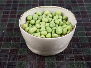 Crunchy whole peanuts with a wasabi-flavored coating