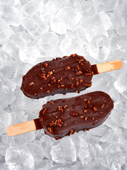 Ice cream lollies set on a bed of ice cubes
