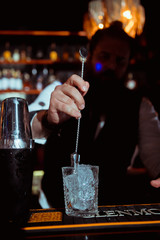 process of preparing a cocktail bartender