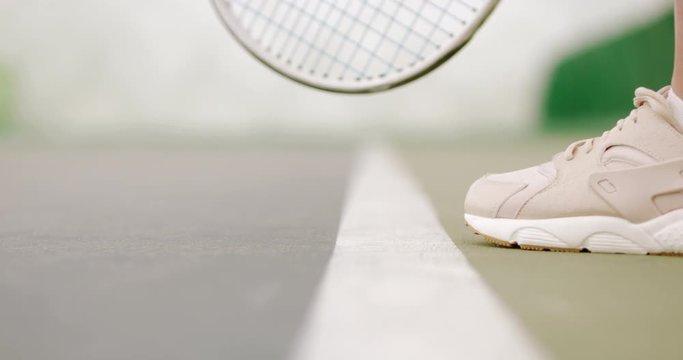 EXTREME CU on feet of Caucasian female tennis player serving during a game. 120 FPS slow motion, 4K UHD RAW graded footage