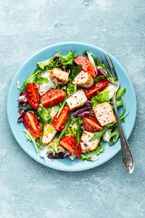 chicken breast salad with fresh vegetables top view and space for a text