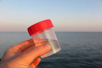 Water quality sample at sea