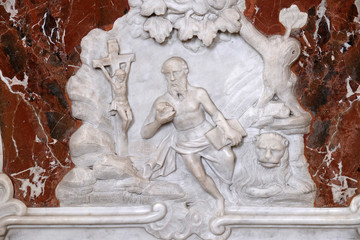 Fototapeta premium Saint Jerome, relief on the altar of Saint Jerome in the Saint John the Baptist church in Zagreb, Croatia