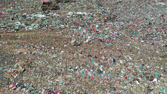 Plastic garbage dumped in landfill. Plastic trash is dumped in Malaysia. Environmental problem because of no recycling