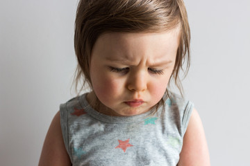 Naklejka premium Sad depressed offended toddler child crying with problems 