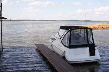 Boats parking - The modern boat on the mooring