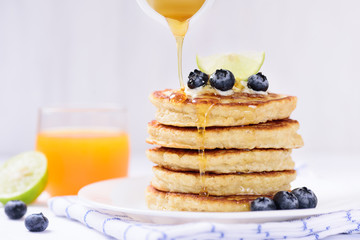 Oatmeal pancake with blueberry and honey