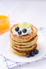 Oatmeal pancake with blueberry and honey