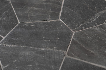 an interior with a patternless stone floor background