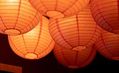 a round, bright orange lantern © kgeon_snap
