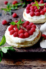Tart with cheese cream and raspberries