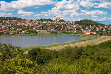 Tihany village with the abbey and the innert lake framed by a forest and a nice cloudscape at Lake...