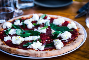 fresh italian buffalo pizza with basilic & creamy cheese