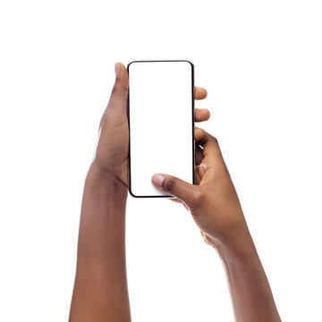 African American Woman Using Cellphone With Empty Screen, Closeup
