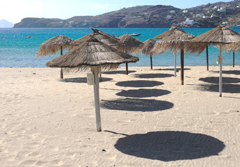 Greece the island of Ios.  Parasols at Mylopotos beach.