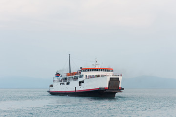 passenger ferry sailing in the ocean between the islands of Thailand