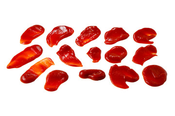 Red sauce splashes isolated on white background. Ketchup.