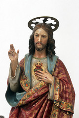Obraz premium Sacred Heart of Jesus, statue on the altar of the Saint Joseph in the Church of the Assumption of the Virgin Mary in Klostar Ivanic, Croatia